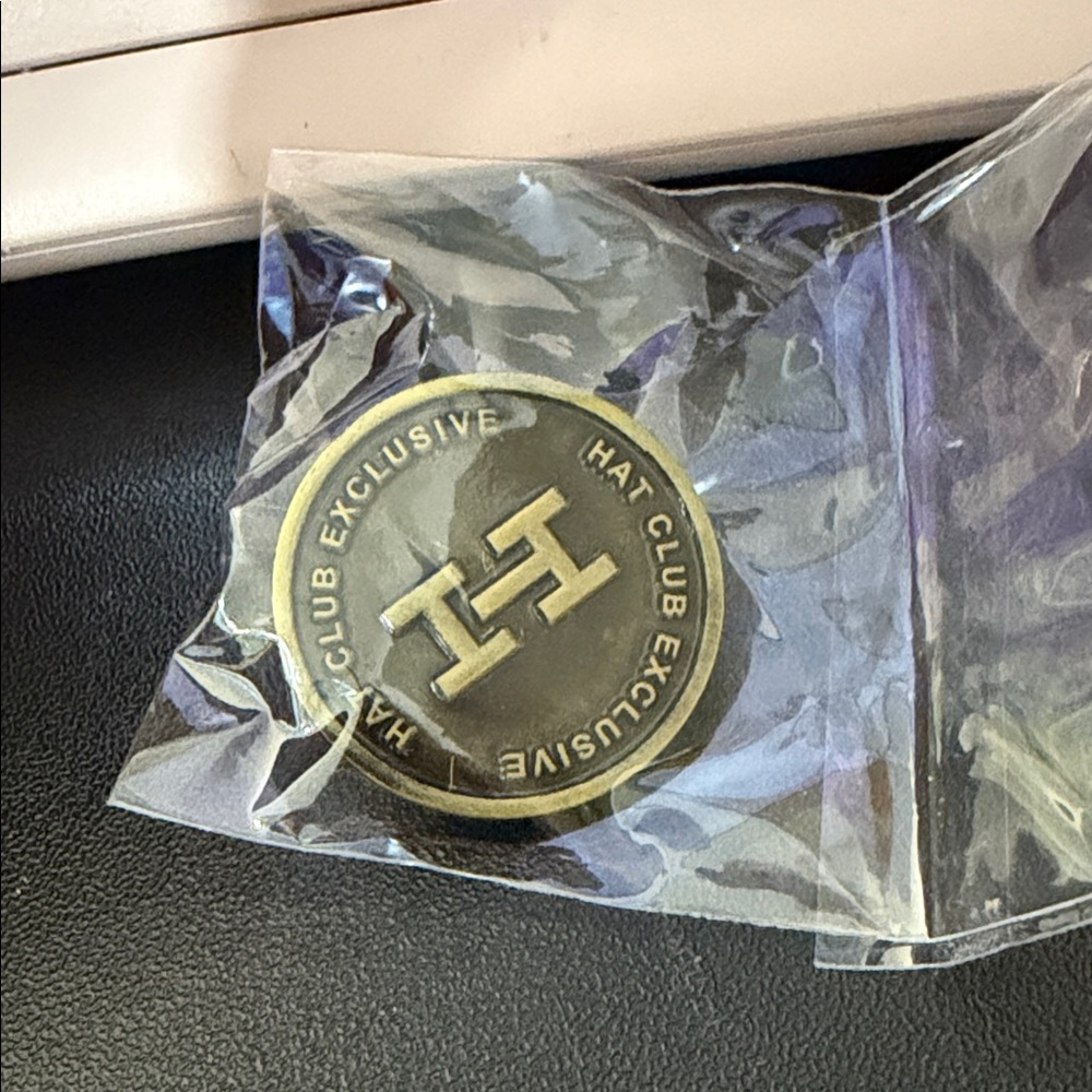 Exclusive Black and Gold Pin